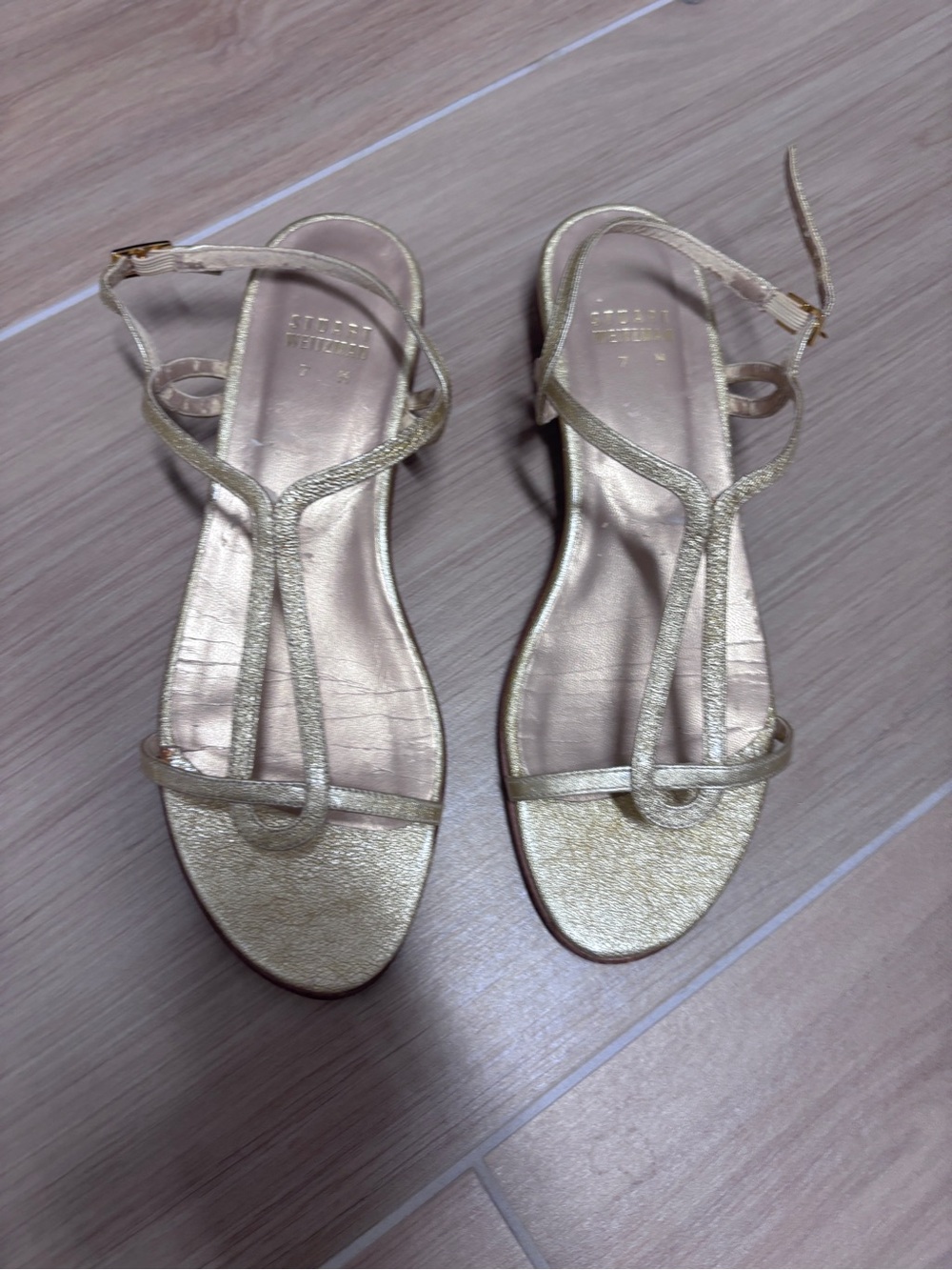 Stuart Weitzman Metallic Gold T-Strap Sandals